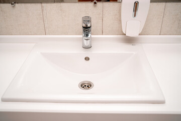 Public sinks, Handwashers for people using public toilets, Cleaning after using the toilet service, Public toilets and hygiene concept.