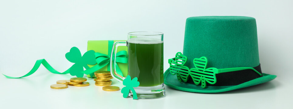 Different St.Patrick's Day accessories on white table