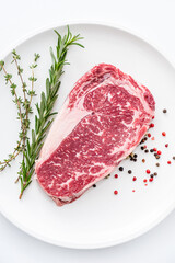 Fototapeta premium Close up beef rib eye steak isolated on white