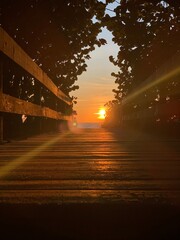 sunset over the boardwalk
