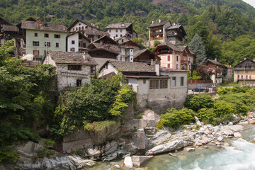 Fototapeta na wymiar View of village of Campertogno, during summer season, in Valsesia (Sesia Valley). Province of Vercelli, Piedmont, Italy.
