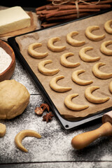Baking tray with traditional German or Austrian Vanillekipferl vanilla kipferl cookies