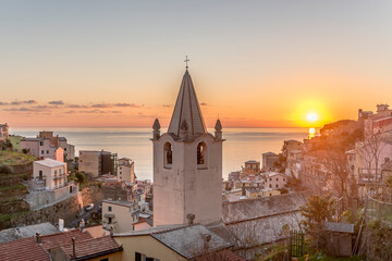 sunset at historical seaside village, Riomaggiore, Italy