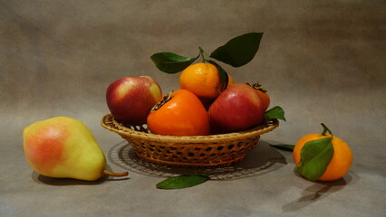 Fruit in a wicker plate, Still Life