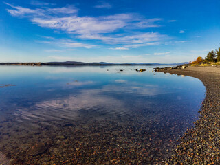 The White Sea coast on a sunny day. The sun's rays. Karelia. 2021. Russia.