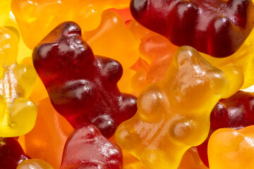 Detailed and large close up shot of different gummy bears.
