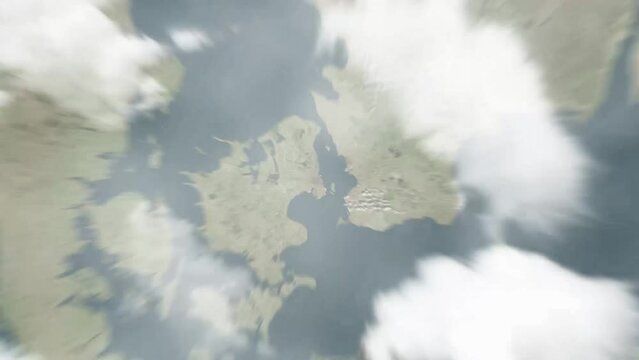 Earth zoom in from outer space to city. Zooming on Denmark, Copenhagen. The animation continues by zoom out through clouds and atmosphere into space. View of the Earth at night. Images from NASA.