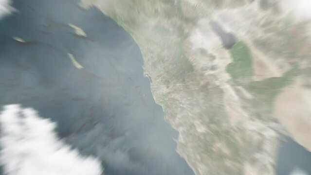 Earth zoom in from outer space to city. Zooming on Mexico, Tijuana. The animation continues by zoom out through clouds and atmosphere into space. View of the Earth at night. Images from NASA. 4K