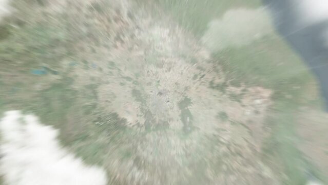 Earth zoom in from outer space to city. Zooming on Mexico, Ecatepec de morelos. The animation continues by zoom out through clouds and atmosphere into space. Images from NASA. 4K