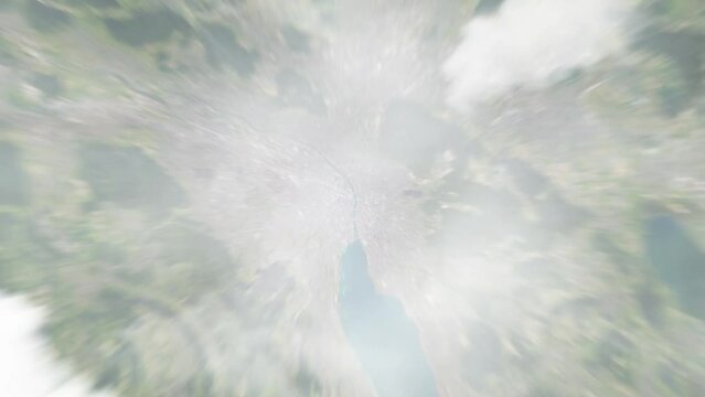 Earth zoom in from outer space to city. Zooming on Zurich, Switzerland. The animation continues by zoom out through clouds and atmosphere into space. View of the Earth at night. Images from NASA. 4K