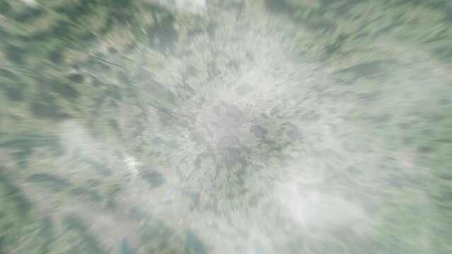 Earth zoom in from outer space to city. Zooming on Winterthur, Switzerland. The animation continues by zoom out through clouds and atmosphere into space. View of the Earth at night. Images from NASA