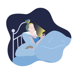 Young woman checking her phone in bed at night