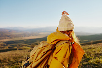 Fototapeta premium woman traveler admiring the landscape mountains nature Lifestyle