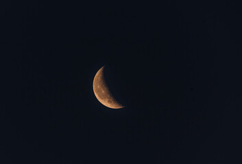 Obraz na płótnie Canvas half moon in the night sky 
