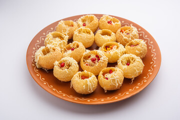 Cheese Pani Puri © StockImageFactory