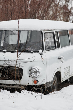 Abandoned retro car Barkas-Werke, winter in the forest