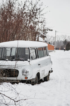Abandoned retro car Barkas-Werke, winter in the forest