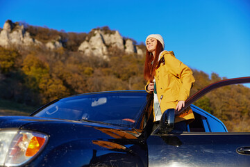 woman tourist cars trip to mountains landscape Trip relaxation
