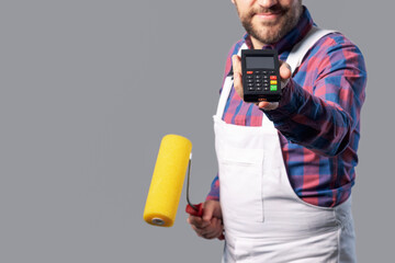 Professional painter holding a POS terminal © StockPhotoPro