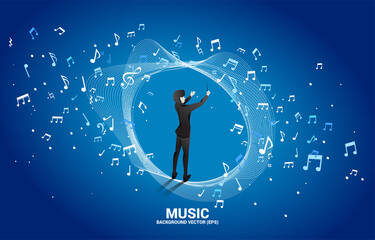 Vector silhouette of conductor standing with flying music note . Concept background for orchestra concert and recreation. © Panithan