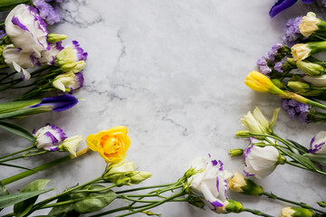 Beautiful bouquet of flowers: iris, mimosa, tulip, , lisianthus. Happy easter, happy mothers day concept. Copy space. advertisement, invitation, announcement for designers.
