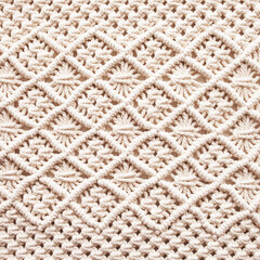 Handmade macrame. Macrame braiding and cotton threads.  Female hobby.  ECO friendly modern knitting natural decoration concept