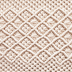 Handmade macrame. Macrame braiding and cotton threads.  Female hobby.  ECO friendly modern knitting natural decoration concept