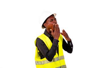 young tired engineer man yawning.