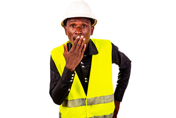 young surprised engineer man covering mouth with hand.