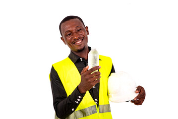 young man technician holding bottle of water smiling.