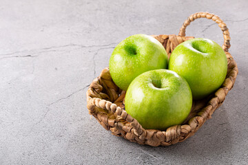 Green apples on the table.