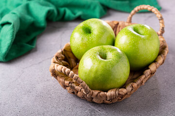 Green apples on the table.