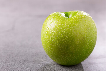 Green apples on the table.