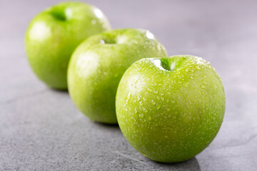 Green apples on the table.