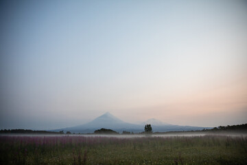 The active Kamchatka Volcano Klyuchevskaya Sopka at dawn