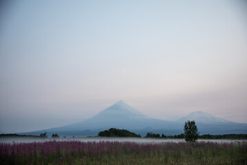 The active Kamchatka Volcano Klyuchevskaya Sopka at dawn