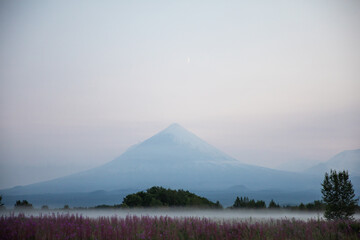 The active Kamchatka Volcano Klyuchevskaya Sopka at dawn