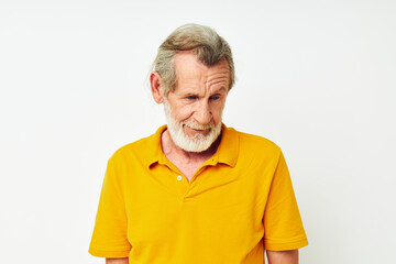 Portrait of happy senior man hand gesture gray beard fun isolated background