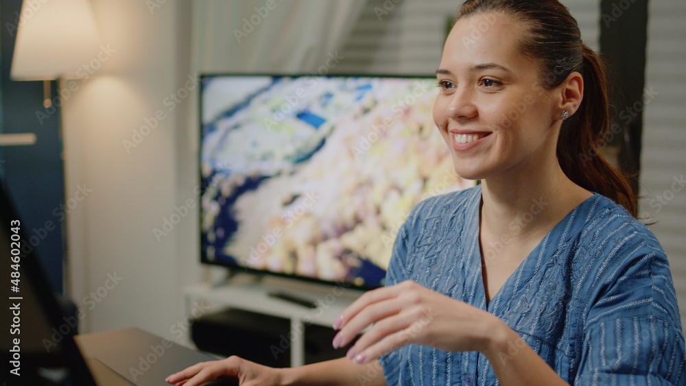 Poster retouch artist using computer and monitor at studio with touchscreen display for photography product