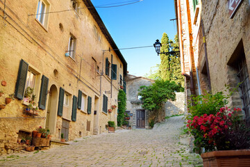 Charming old streets of Volterra, known fot its rich Etruscan heritage, located on a hill overlooking the picturesque landscape. Tuscany, Italy.