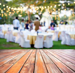 Empty wood table with blur people outdoor party