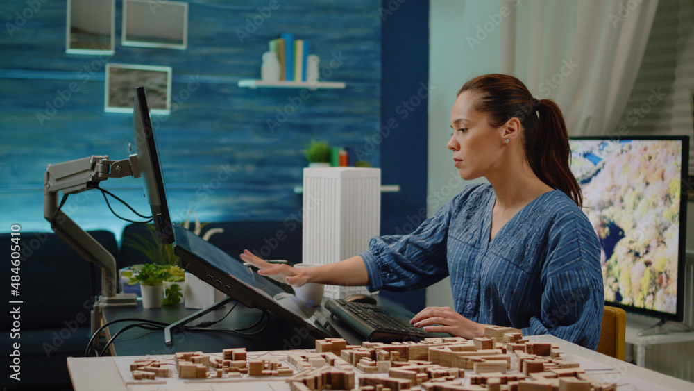 Poster adult working as architect with blueprint plan for construction in architectural office. professiona