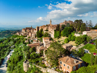 Fototapeta na wymiar Aerial summer day view of Montepulciano town, located on top of a limestone ridge surrounded by vineyards. Vino Nobile wine territory, known worldwide for its wine and food tours.