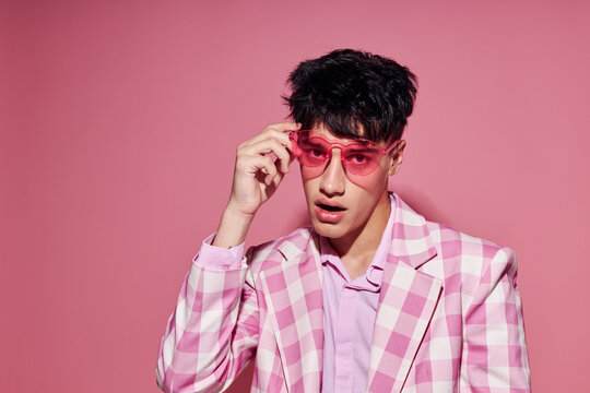 Photo of romantic young boyfriend self confidence pink plaid blazer fashion posing model studio - Powered by Adobe