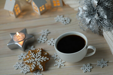 cup of coffee and cookies on wooden table