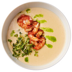 Creamy cheese soup with grilled shrimps