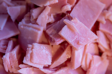 Closeup background texture of diced smoked ham