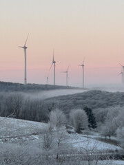 winter landscape with wind turbines