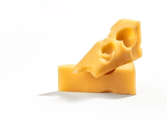 Two pieces of Swiss cheese arranged on white background.