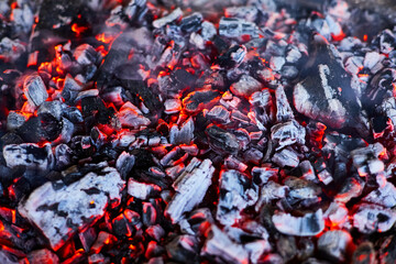 Hot charcoal in the grill. Close-up, selective focus
